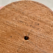 Close detail of gold scrollwork on ceramic Fatima figurine border — hand-applied, Jalisco Mexico