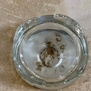 Lid removed showing interior of Art Deco pressed glass powder jar — clean interior, 1925–1935