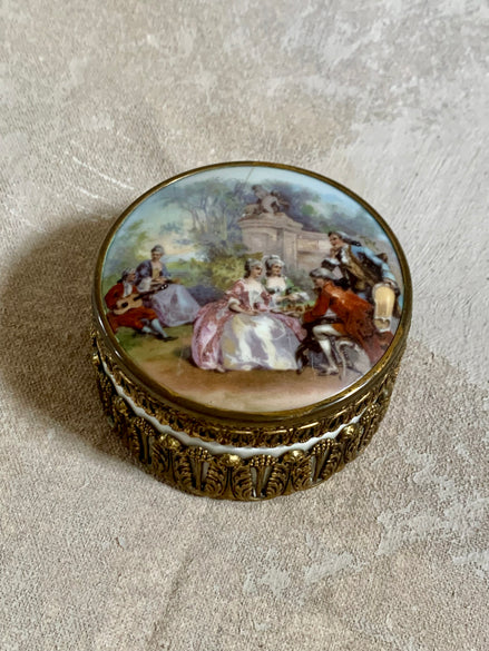 Watteau garden scene lid detail on German porcelain trinket box — six figures in court dress