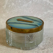 Gold stripe and gilt cartouche on powder blue enamel lid — Art Deco vanity jar detail