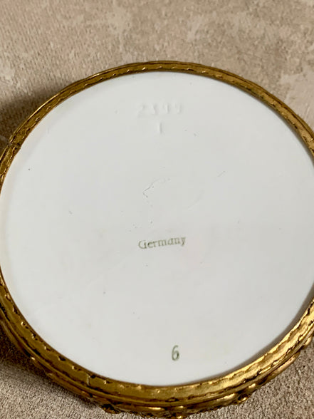 Surface craquelure detail on Watteau scene porcelain lid — century-old age lines, authentic