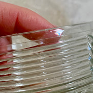Overhead view of Art Deco powder jar showing gilt cartouche on powder blue enamel lid