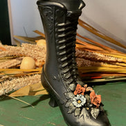 Tall Black Ceramic Lace-Up Boot Vase with Roses and Daisy