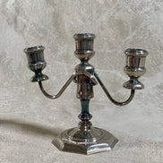 Three S-curve arms of silver plate candelabra with cup bobeches — dining table centerpiece
