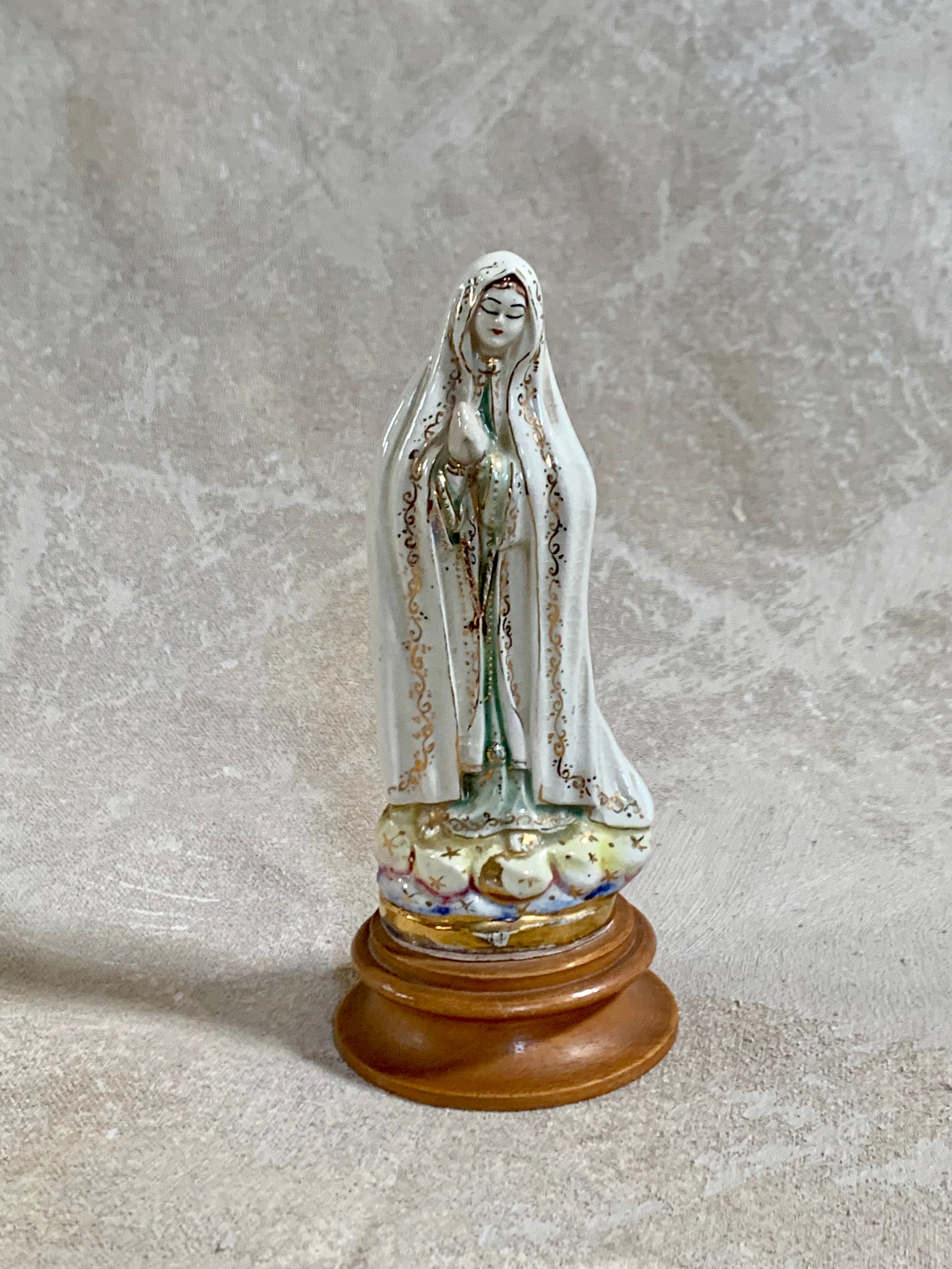 Full height view of Our Lady of Fatima ceramic figurine on wood base — Gilded Estate, Jolene Le Mille