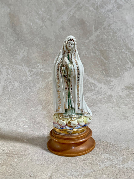 Full height view of Our Lady of Fatima ceramic figurine on wood base — Gilded Estate, Jolene Le Mille
