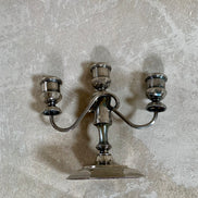 Silver plate candelabra arm detail showing S-curve form and cup holder — 1940s–1960s