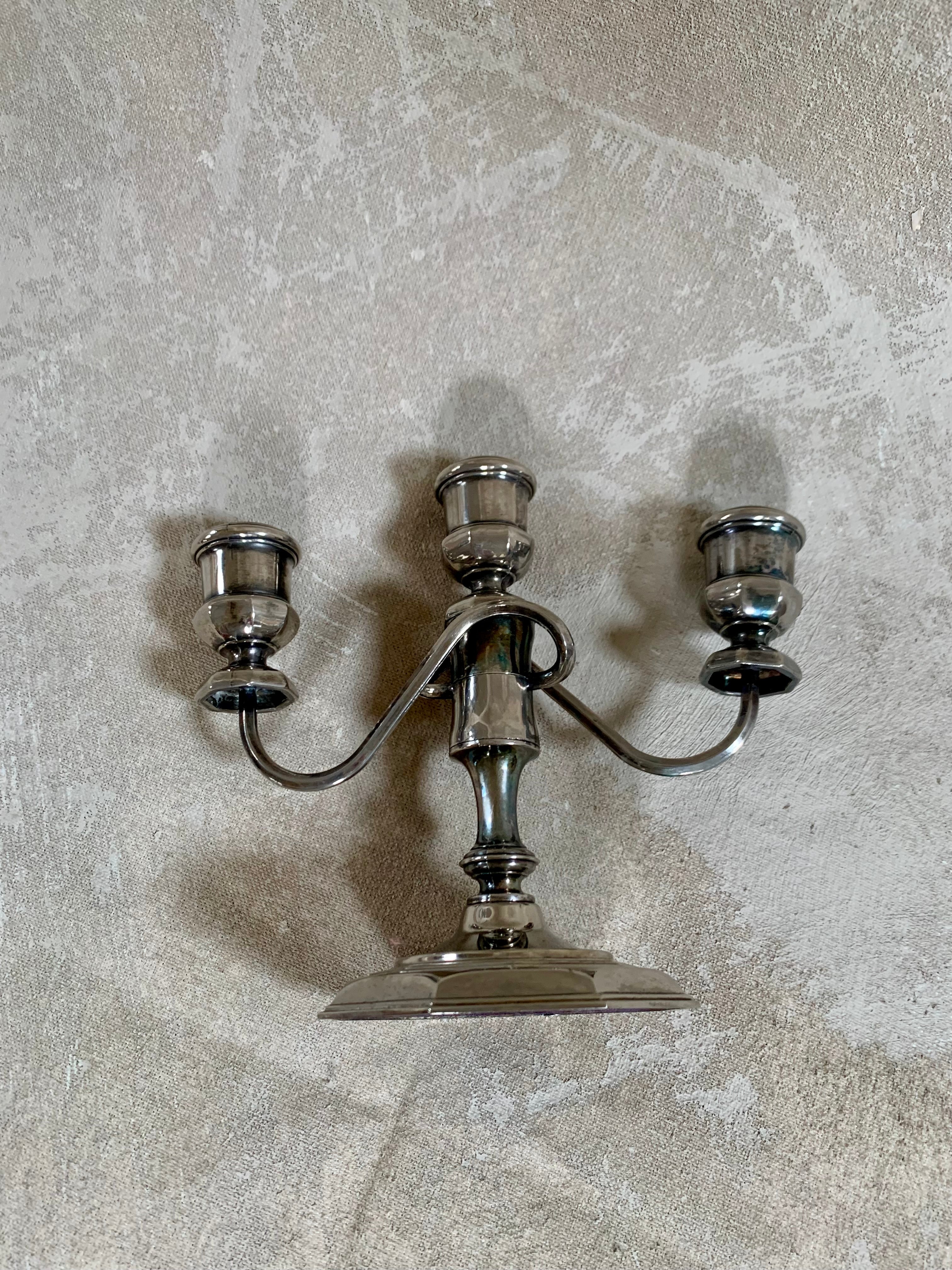 Silver plate candelabra arm detail showing S-curve form and cup holder — 1940s–1960s
