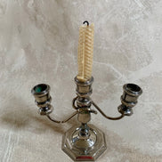 Three-quarter view of silver plate candelabra showing full height and base — Mid-Century