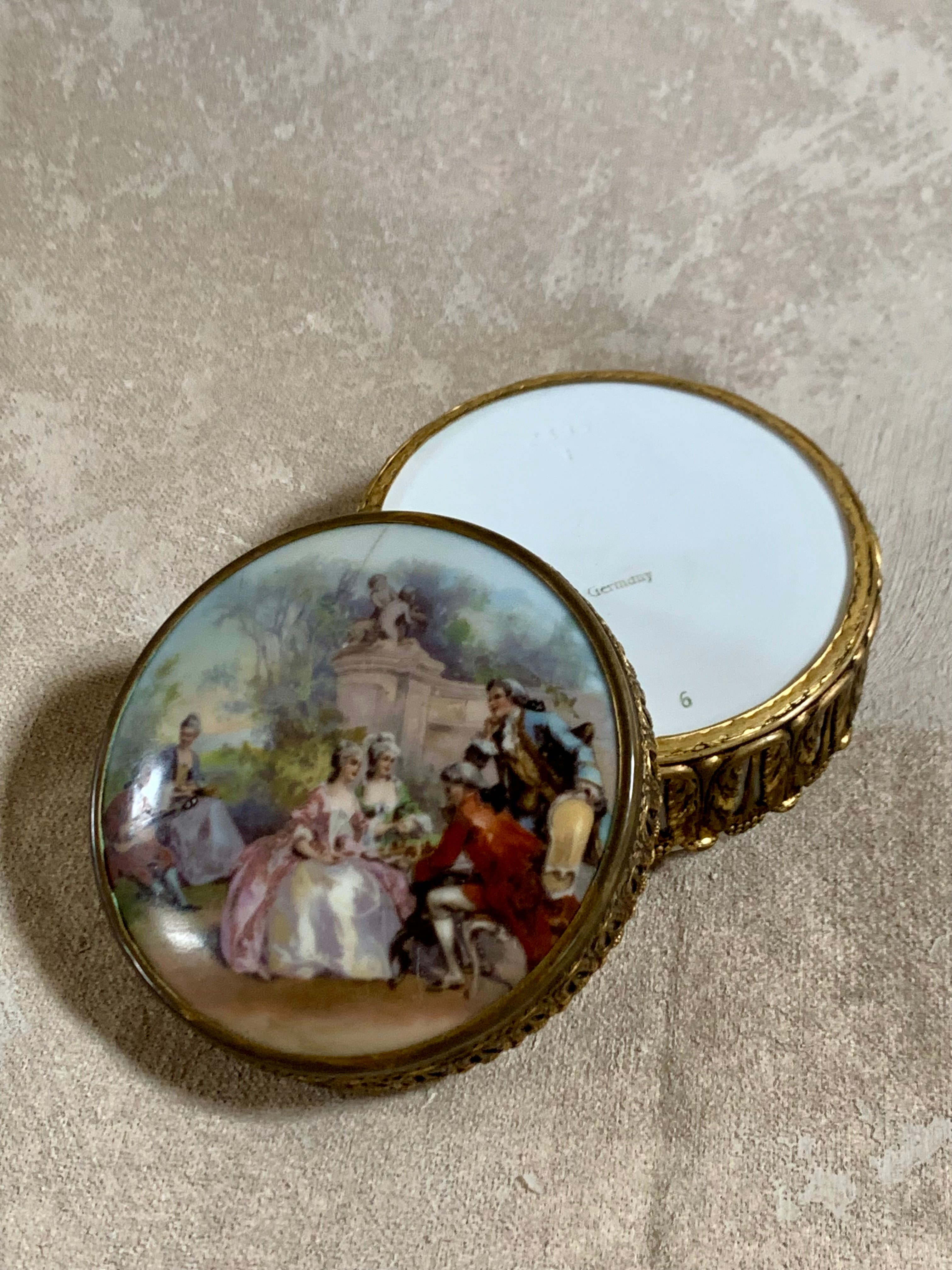 Scale reference of German porcelain Rococo trinket box with ormolu mounts — circa 1895–1914