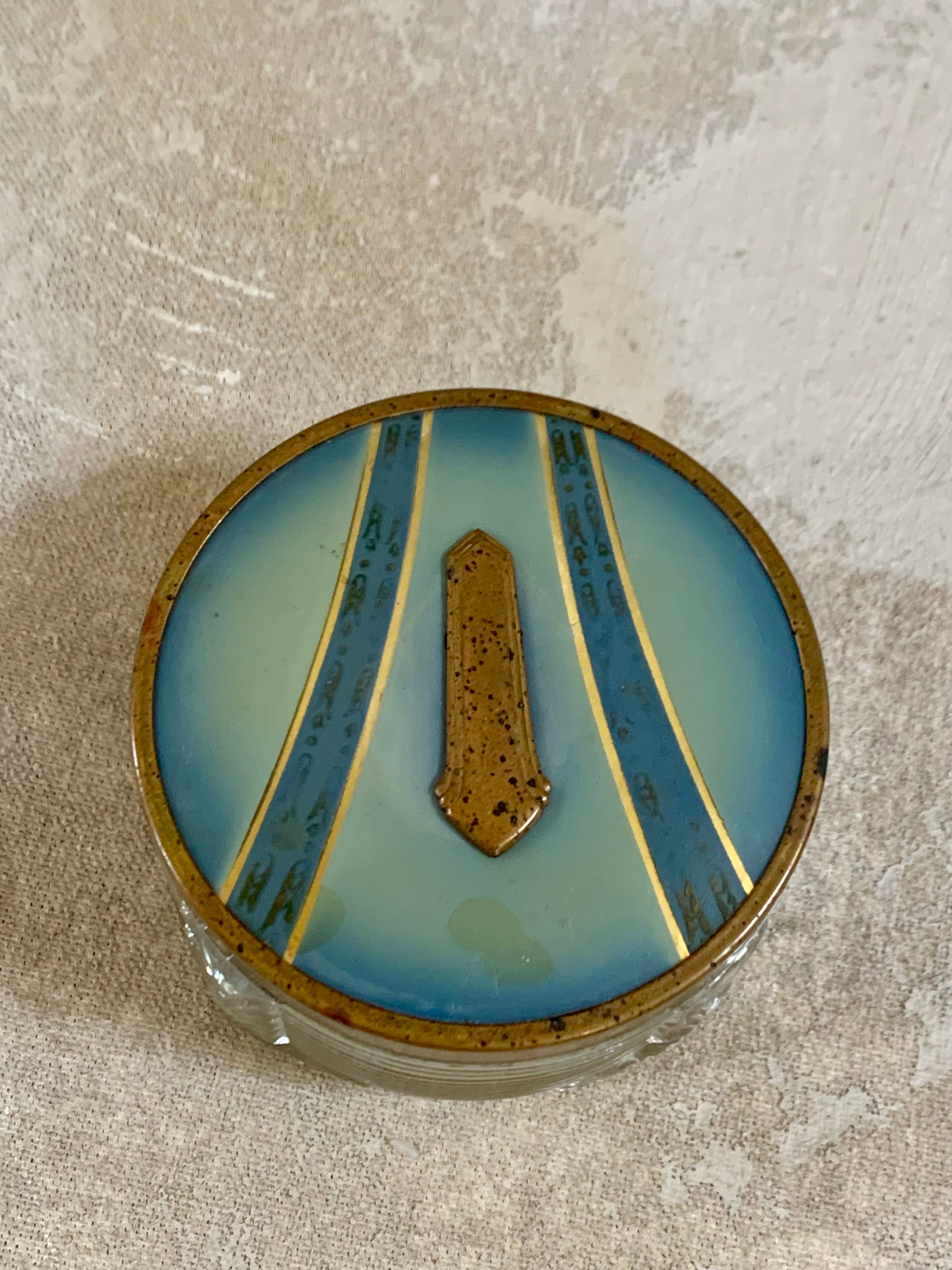 Full view of Art Deco powder jar with blue enamel and gold lid — circa 1925–1935 boudoir decor