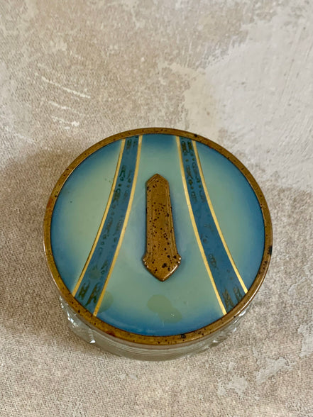 Full view of Art Deco powder jar with blue enamel and gold lid — circa 1925–1935 boudoir decor