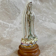 Turned walnut-tone wood base of Our Lady of Fatima figurine — inscribed Mexico, 1950s