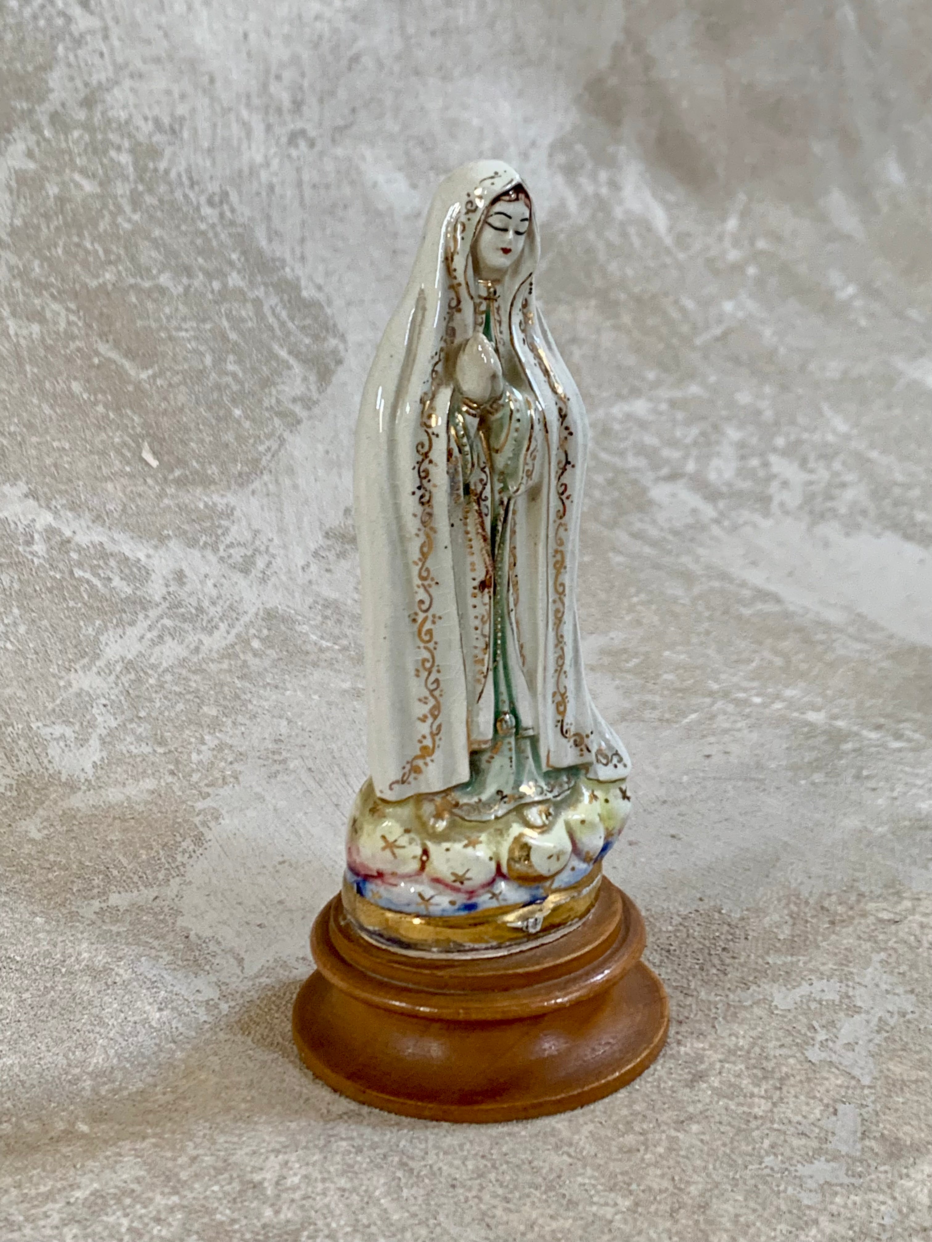 Turned walnut-tone wood base of Our Lady of Fatima figurine — inscribed Mexico, 1950s