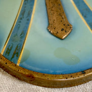 Three-quarter view of Art Deco powder jar with blue and gold lid — Jolene Le Mille Archive