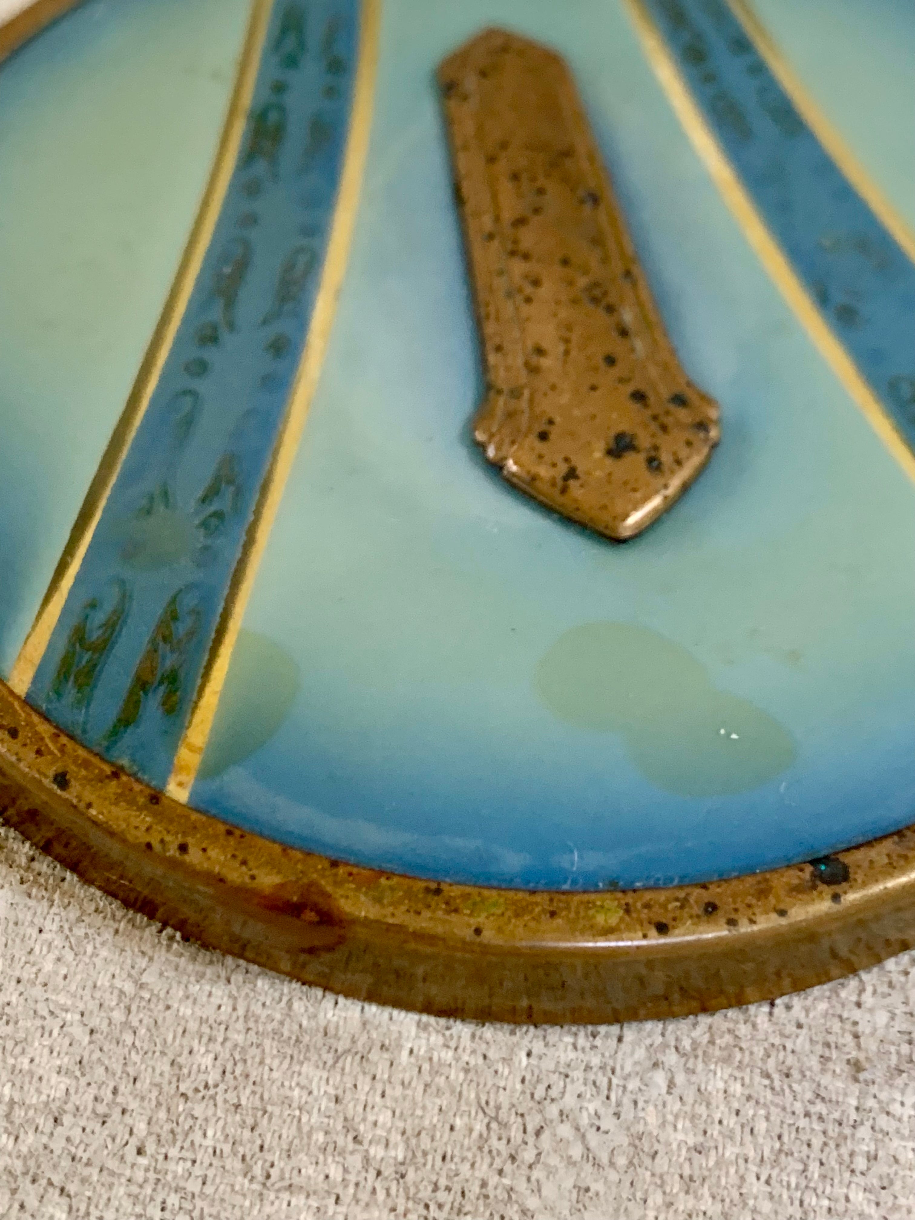 Three-quarter view of Art Deco powder jar with blue and gold lid — Jolene Le Mille Archive