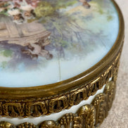 Interior of antique German porcelain trinket box — clean white bisque, ormolu mounts intact