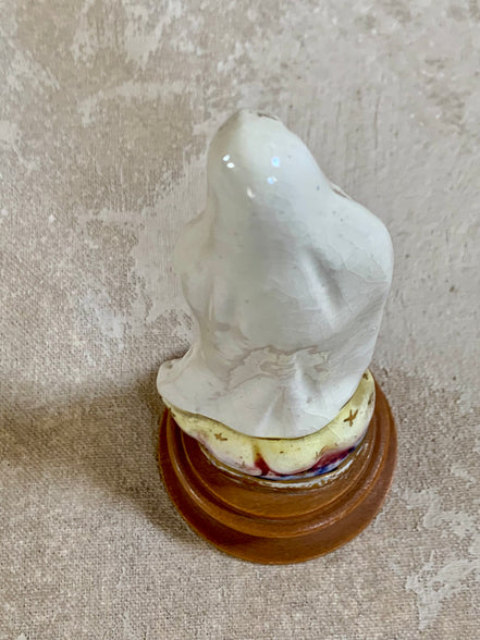 Overhead view of Our Lady of Fatima figurine showing crown and veil detail — Jalisco Mexico