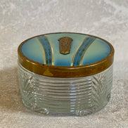 Side profile of Art Deco pressed glass powder jar — blue enamel lid, gold decoration, 1925–1935
