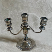 Silver plate candelabra showing natural tarnish and patina — authentic age wear